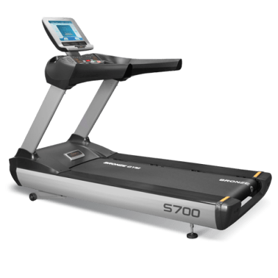 Беговая дорожка BRONZE GYM S700 TFT (Promo Edition) Мощная электрическая беговая дорожка BRONZE GYM S700 TFT разработана для эксплуатации в клубах с высокой проходимостью.
Отличается одной из самых мощных рам в классе, вместе с консолью общий вес дорожки составляет 216 кг.
Двигатель: 5.0 л.с. Fuji Electric (переменный ток)
Скорость: 1 - 20 км./ч.
Беговое полотно: 4.6 мм. особопрочное ортопедическое профессиональное Habasit NVT-296.
Размер бегового полотна: 157х54 см.
Регулировка угла наклона: электрическая.
Наклон бегового полотна: 0 - 20%.
15-ти дюймовый (37 см.) сенсорный полноцветный LCD дисплей.
Кол-во программ: 13 (в т.ч. пульсозависимые)
Размер в рабочем состоянии (ДхШхВ) 222х95х173 см.
Максимальный вес пользователя: 220 кг. 
Гарантия: 2 года.
